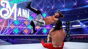 AJ Styles running forearm to Shinsuke Nakamura